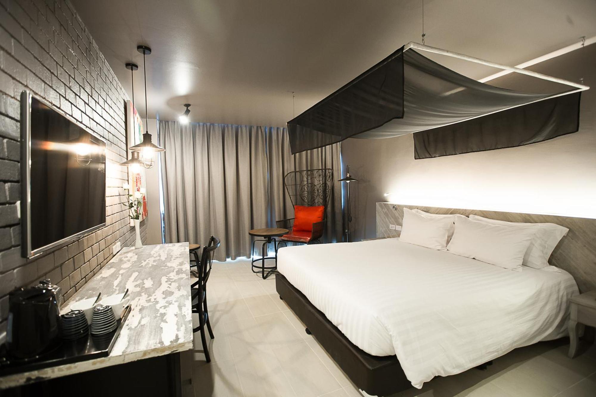 Art Mai Gallery Nimman Hotel Chiang Mai Exterior foto A room at the hotel